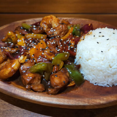 Asian Bodega classic asian food kung poa chicken tofu food truck restaurant at Palma Central in Tulum Mexico